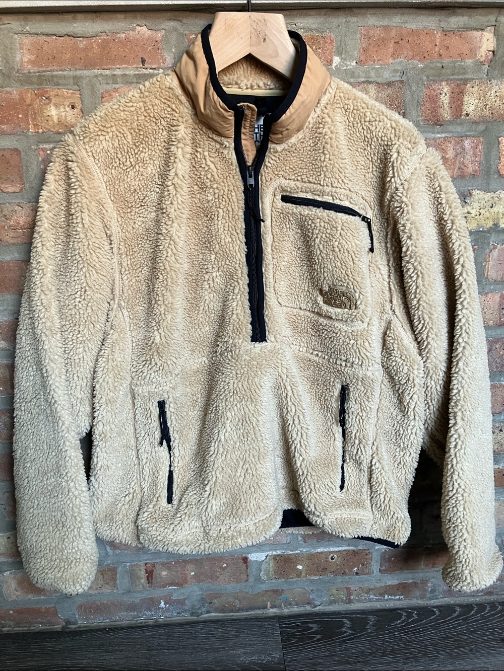The North Face Extreme Pile Pullover in an almond butter/tan colorway